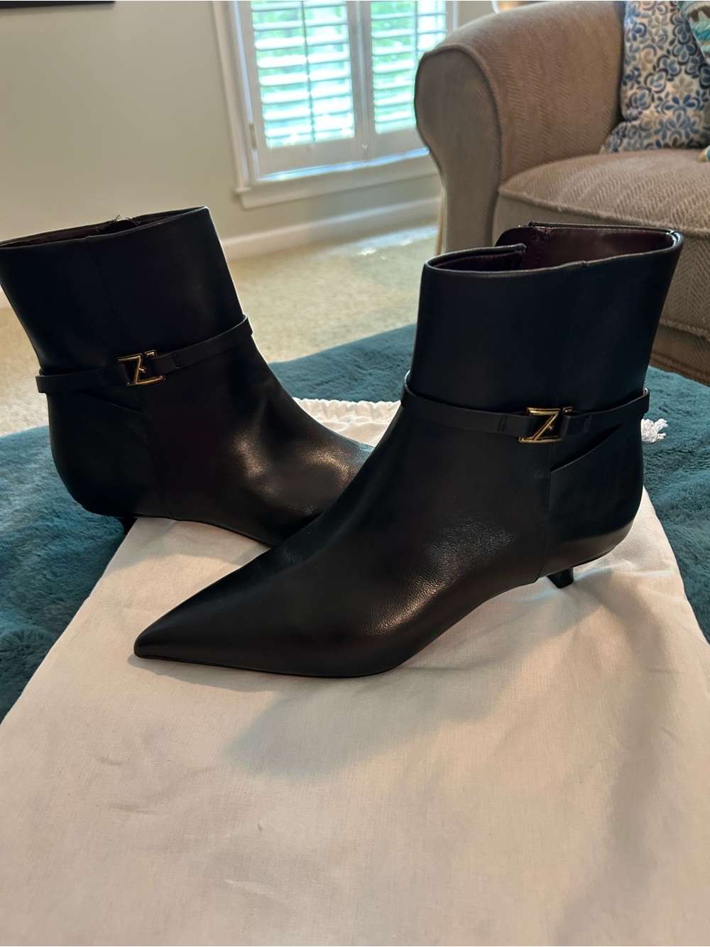 Franco Sarto Black Leather Pointed-Toe Ankle Booties with Gold Z Accent